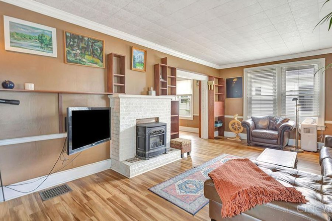 LIVING ROOM - Furnished Mile Square Home | Walk/Bus | Local Owners | Entire Unit or Individual Rooms