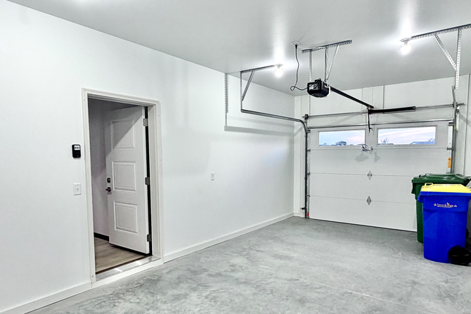 1 stall garage, ample street parking. - Duplex near the nature park