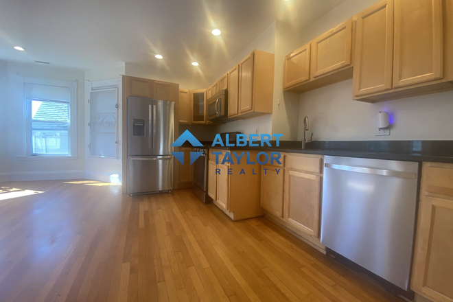 Kitchen/Living Area - Gorgeously Renovated 7 Bedroom near Campus!!