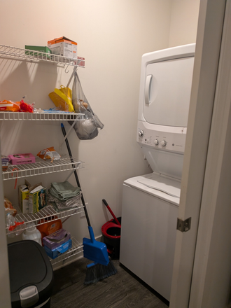 Washer/dryer and pantry - Park at main Apartments