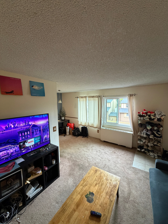 Living room to dining area-brand new windows - One bedroom Wimbledon condo $1650/mo