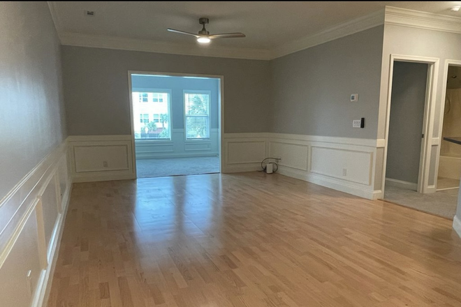 Living room and sun room. - Pelican pointe villas
