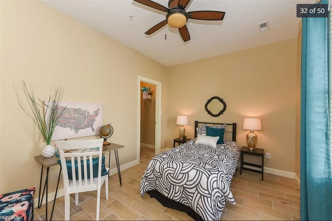 Room available for rent is similar, not furnished, with industrial ceilings - River Run Living Apartments