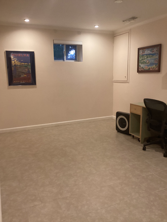 Bedroom with desk, chair, air filter, extra storage - Bright Basement Apartment in SFH at Glebe, S. 16th, Walter Reed Dr.