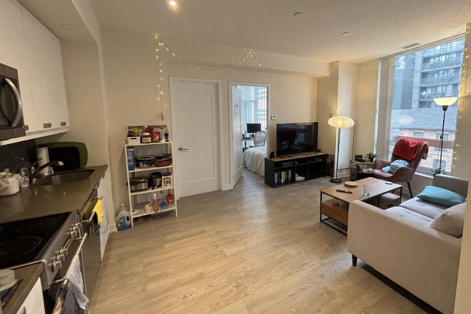 Living Room - Furnished Master Bedroom in Luxury Downtown Toronto Condo | Pool, Gym & Laundry