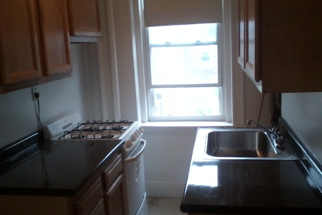 Hub Realty - Large front one bedroom split, with renovated kitchen, in Allston