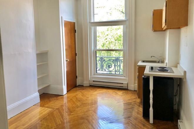 Visit hubrealtyproperties.com - Bright and sunny studio with high ceilings