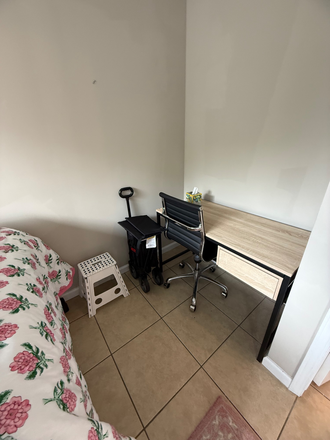 Desk and chair that comes with the room this little nook is a great place for it can be moved though - State on Campus Apartments