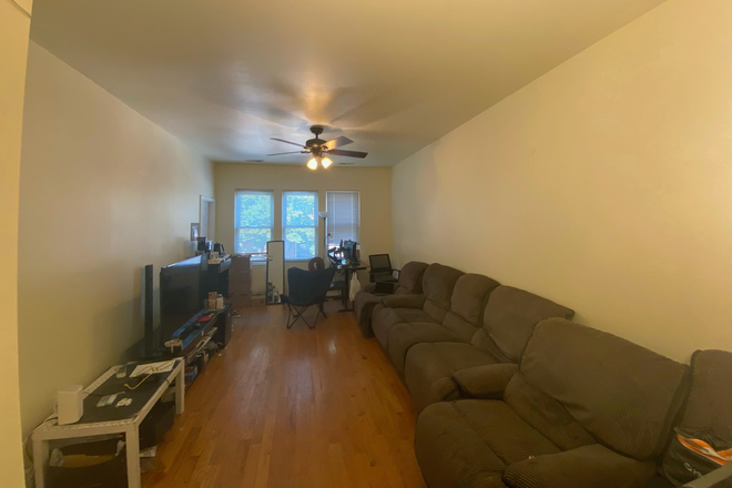 Living room - Second-story walk up in Pilsen Apartments