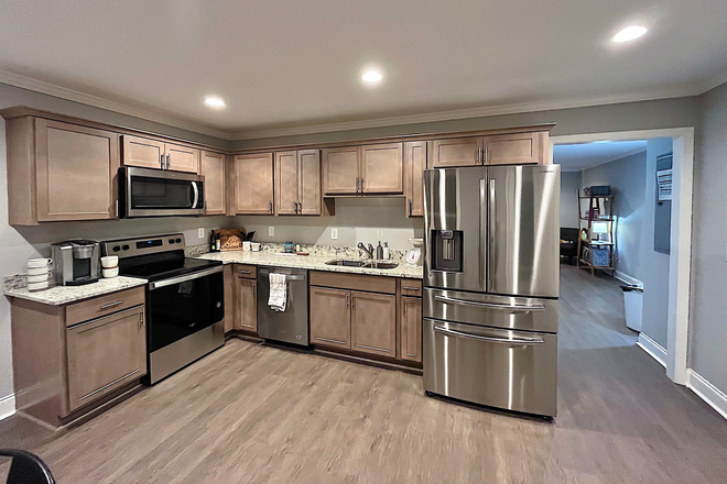 Eat in kitchen - ideal for male roommates. Shared bedrooms 2 roommates per room. Walk to campus.