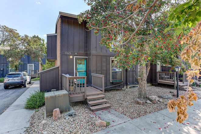 1 - 3 Level Townhome with Private Fenced Patio Next to Open Fields!
