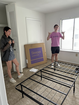 Me at move in with my sister. The room looks a lot different now. - Foxridge Apartments
