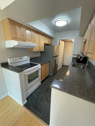 Kitchen - 2-bedroom townhouse, East Campus, open space/trails, pool, washer/dryer, patio, bus stop