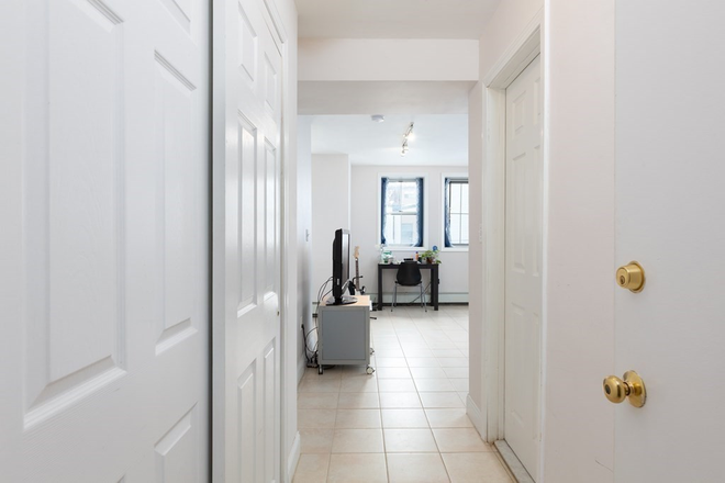 Apartment entrance - Studio apartment close to Harvard, no fees, utilities included, chance to renew lease 9/1/2026