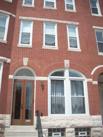 Front of the Building - Beautiful 3-bedroom apartment on the 2 upper floors of a brownstone house in Historic Reservoir Hill