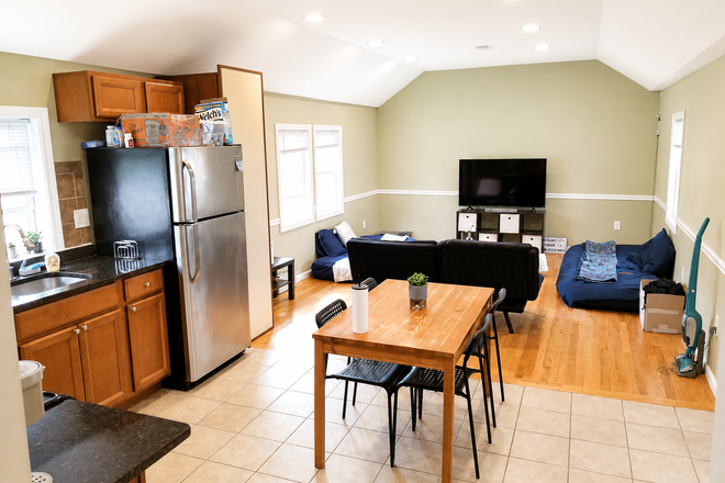 Open Layout Kitchen living room- high cathedral ceilings - 3BR/2BA Waltham Apartment | $3,300 | NO FEE | Parking | Laundry | Central A/C