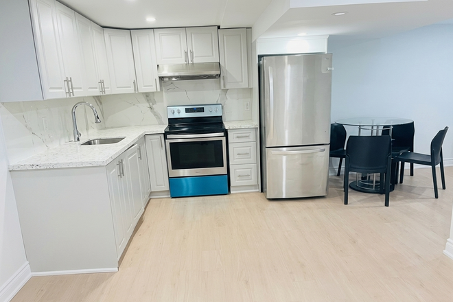 Kitchen and Hall - Newly Renovated Basement Apartment near University of Toronto (Scarborough Campus) – All-Inclusive