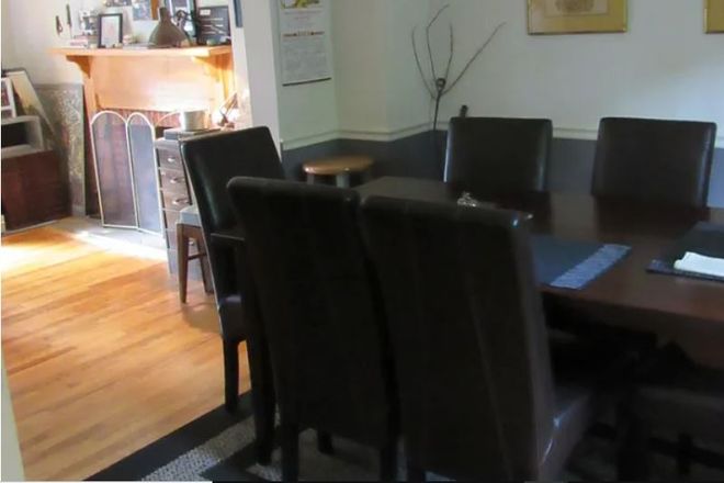Dining room, living room in background - SOUTH MERRITT MILL ROAD. LOOKING FOR TENANT WITH JANUARY 2027 MOVE-IN DATE. FURNISHED INTERIOR. House