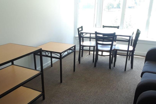 Living Area - South Campus Commons 3 Apartments