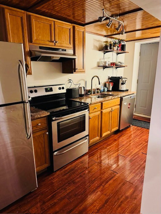 kitchen - Lower level apartment in renovated charming, brick rowhouse, private entrance