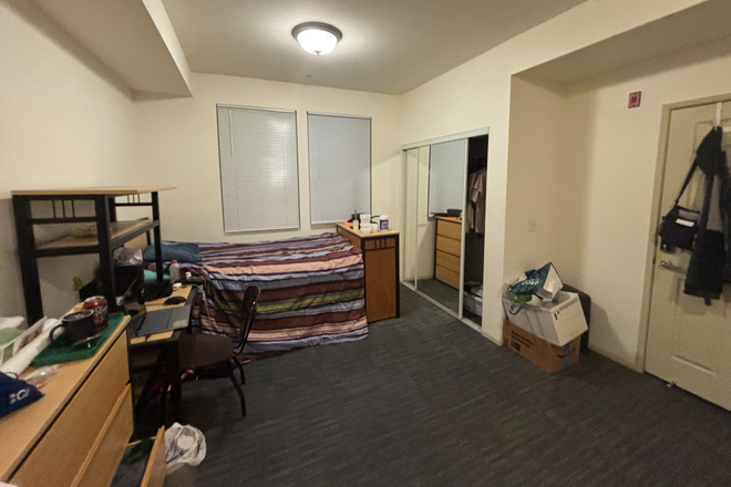 Photo showing window-side bed from other bed - Vista Del Campo Norte 2-person Shared Bedroom, Shared Bathroom | Both beds available at same time!