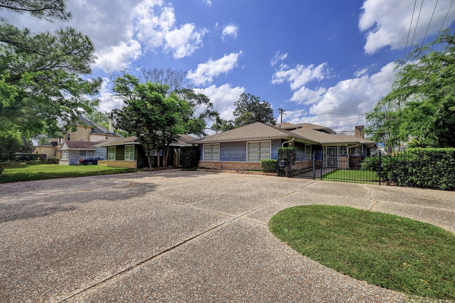 Front of house with plenty of parking - Five Bedroom Home