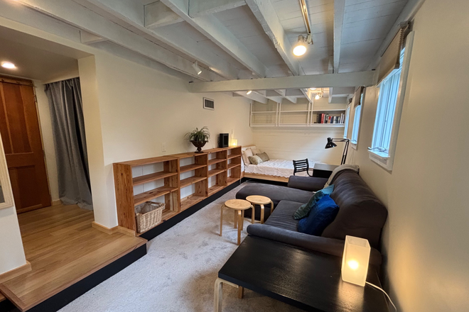 Living space - Garden level studio with easy commute and free parking