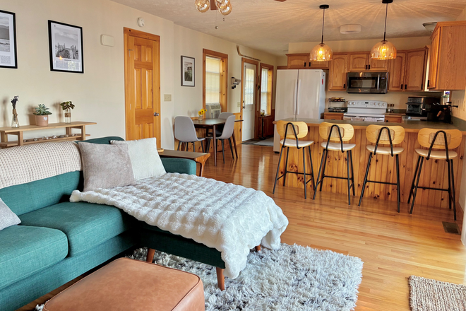 Living Room & Eat In Kitchen - Inviting Lakefront Home - Modern, Clean, Comfortable