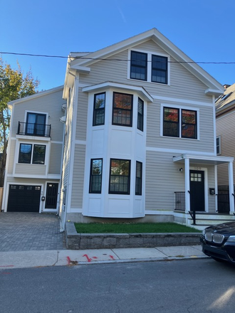 Outside street view - Sunny townhouse on three floors in central Jamaica Plain