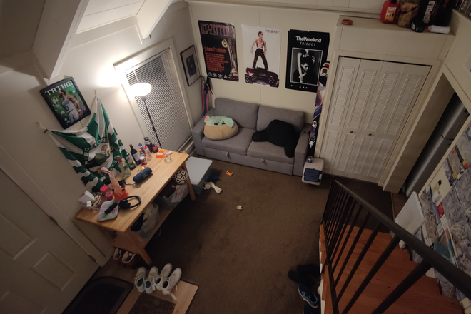 other side of living room from stairs - Puffton Village Apartments