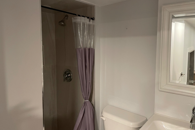 Bathroom - Modern / Semi-furnished and laundry included 1 Bedroom Apartment