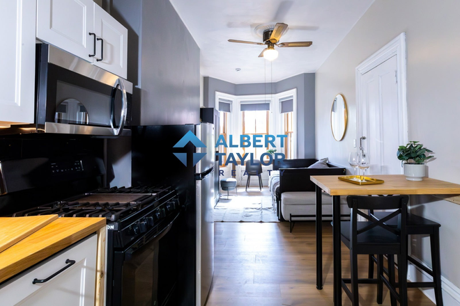 Kitchen / Living Area - **NO BROKER FEE* Furnished Studio w/ Large Windows - Steps from Everything!