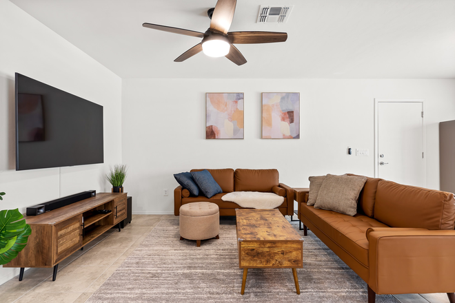 Living room with smart TV, sound bar - Fully furnished, newly-built house close to U of A and Banner (terms negotiable)