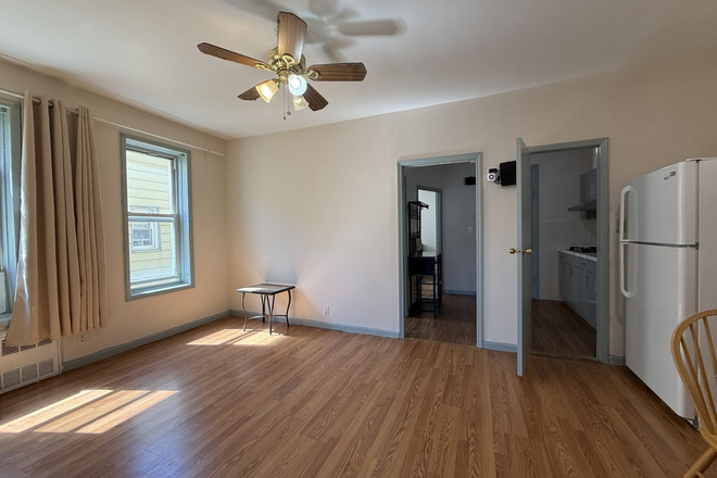 Spacious living room with bright windows - **$2,800 – Newly Renovated 3-Bedroom Apartment in Dyker Heights, Brooklyn | No Broker Fee**