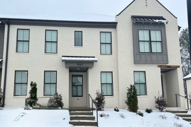 Outside of unit - Spacious Townhome Right Near Campus