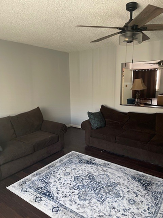 Living room - Primary room with Bathroom - in a 3 bedroom 2 bath home- FEMALE only