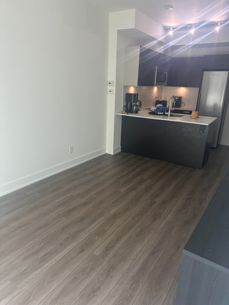 Living Room - 1BR Condo at 57 St Joseph – Steps to UofT & Bloor Subway