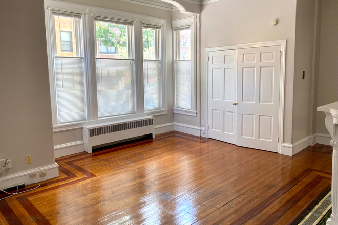 Living Room - Studio Apartment. Walk 5 Blocks to Brown. Heat and Hot Water Included.