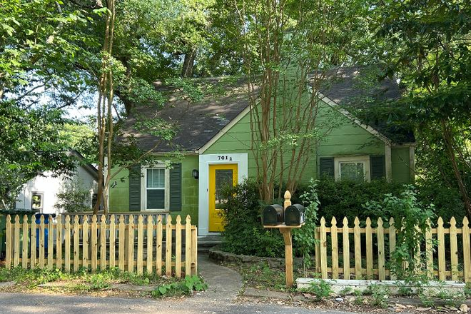 Curbside view of Historic Beltline/Grant Park Cottage - 4 Bedroom MODERN LUXURY, HISTORIC CHARACTER, URBAN WALKABILITY