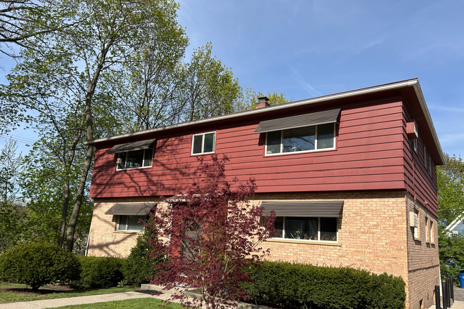 Exterior. West facing. That's Cherokee Red, a color Frank Lloyd Wright frequently used. - Downtown Ann Arbor, Private Cul-de-Sac, Small Private Building, Mature Tenants, Lots of Parking