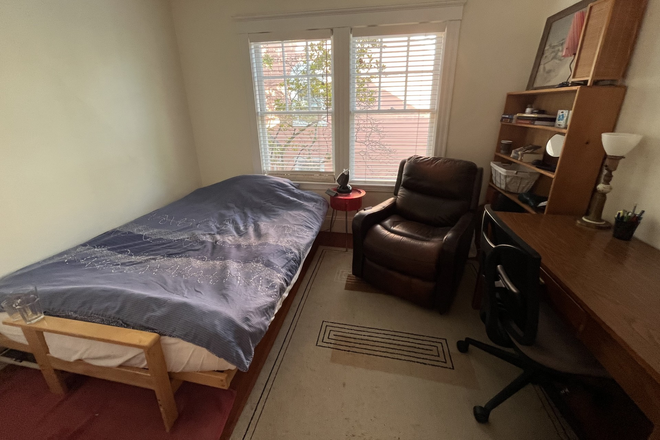 Large bed with plenty of natural light. - Furnished Room Available Now Near Harvard & Red Line