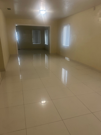 living area - 4/2 House- Across from Red Rd Commons...walk to UM Campus