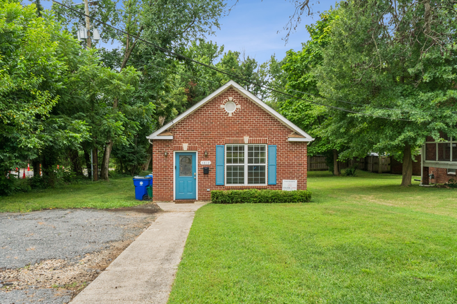 Driveway and Front of House - 4BR/1BA Converted Firehouse Near UMD – Free Driveway Parking & Metro Access