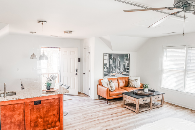 View from bed into living area - Turn Key Furnished Studio in DT Decatur