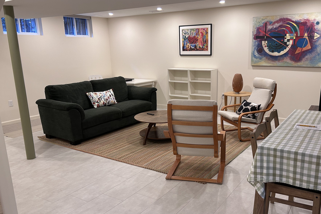 Living area - Spacious newly renovated furnished basement apartment close to Tenleytown