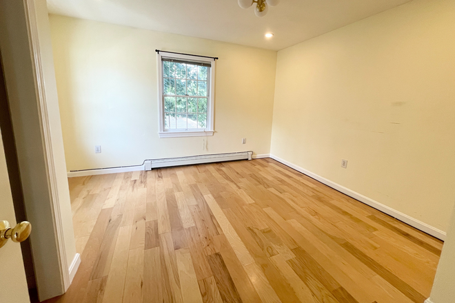 Bedroom - Spacious 4BR Single-Family on Holden St – 3 Floors, In-Unit Laundry Apartments