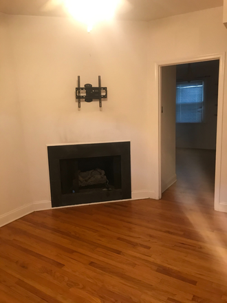 Living Room/Dining Room - Logan Circle - 1611 6th St. NW. Two Bedroom, 1.5 Bath Townhouse. Large Yard. Central Air.