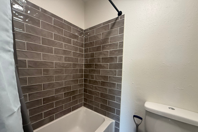 Bathroom in Bedroom - Stylish Studio Condo on NC State University Campus