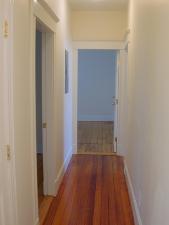 Entrance to Apartment and Corridor. - 69 River Street, Cambridge Townhome