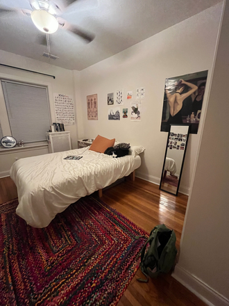 Bedroom with queen-bed, double-closet, and street-facing windows - Summer Sublet Close to Campus